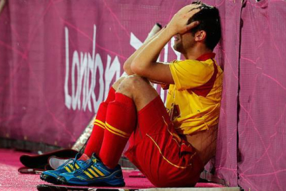 Roc Oliva llora después de la eliminación de la selección española de hockey hierba tras empatar con Gran Bretaña. Foto: ERANGA JAYAWARDENA | AP