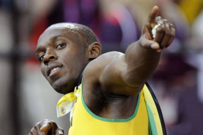 Usain Bolt celebra la victoria en los 100 metros.