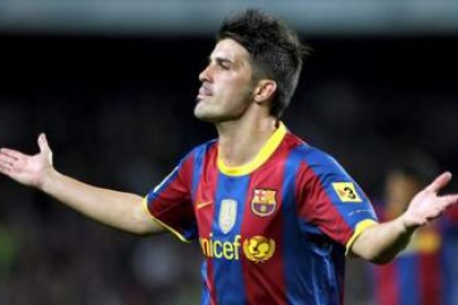 Villa celebra el primero de los dos goles que consiguió frente al Sevilla en el Camp Nou.