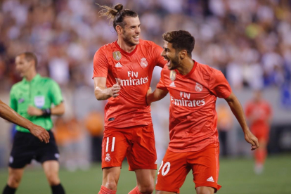 Bale (i) y Asensio celebran uno de los goles ante la Roma.