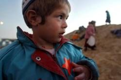 Un niño de una colonia judía de Gaza con la estrella de David naranja en su pecho