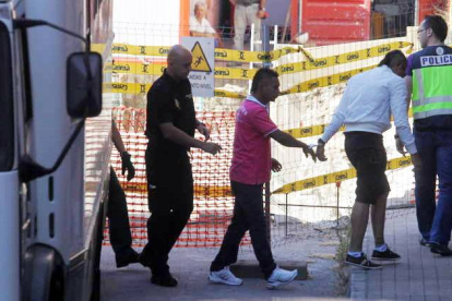 Dos de los detenidos por el homicidio, en una imagen tomada el día que pasaron a disposición judicial.
