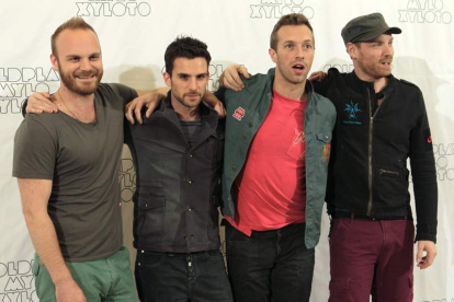 Los miembros del grupo Coldplay, ayer en Madrid.