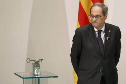 El presidente de la Generalitat, Quim Torra, durante la comparecencia ayer en el Palau. ANDREU DALMAU