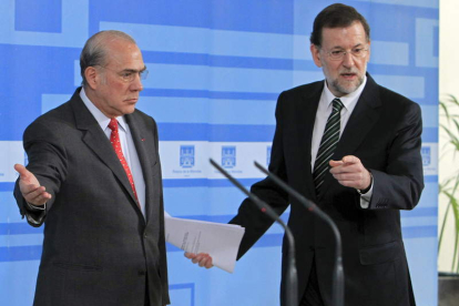 El secretario general de la Ocde, Ángel Gurría,  y Rajoy durante la rueda de prensa conjunta.