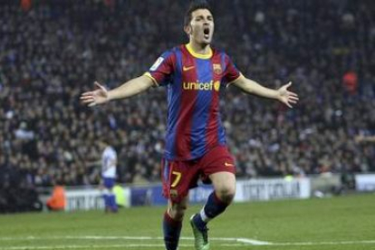 El delantero asturiano del Barcelona, David Villa, celebra la consecución del cuarto gol del Barça.