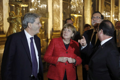 Gentiloni, Merkel, Rajoy y Hollande visitan el Palacio de Versalles. JUAN CARLOS HIDALGO