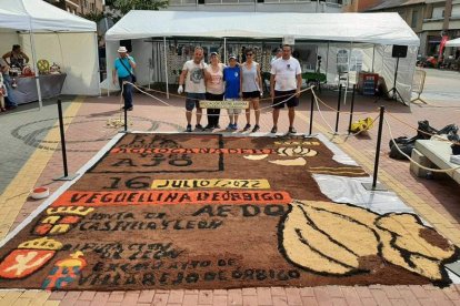 La alfombra de la feria. DL