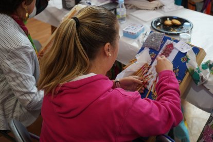 Encuentro de bolilleras en León. J. NOTARIO