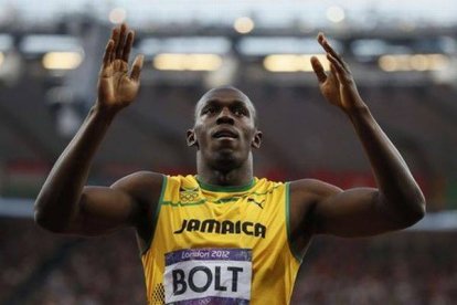 Usain Bolt celebra la medalla de oro en 200 metros en los Juegos de Londres. LUCY NICHOLSON | REUTERS