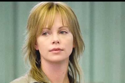 Charlize Theron, por <i>En tierra de hombres</i>.