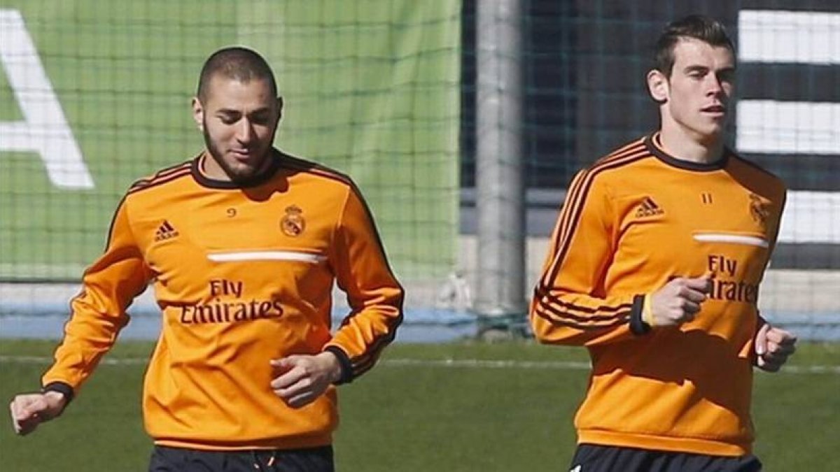Benzema y Bale se ejercitan este viernes en Valdebebas.