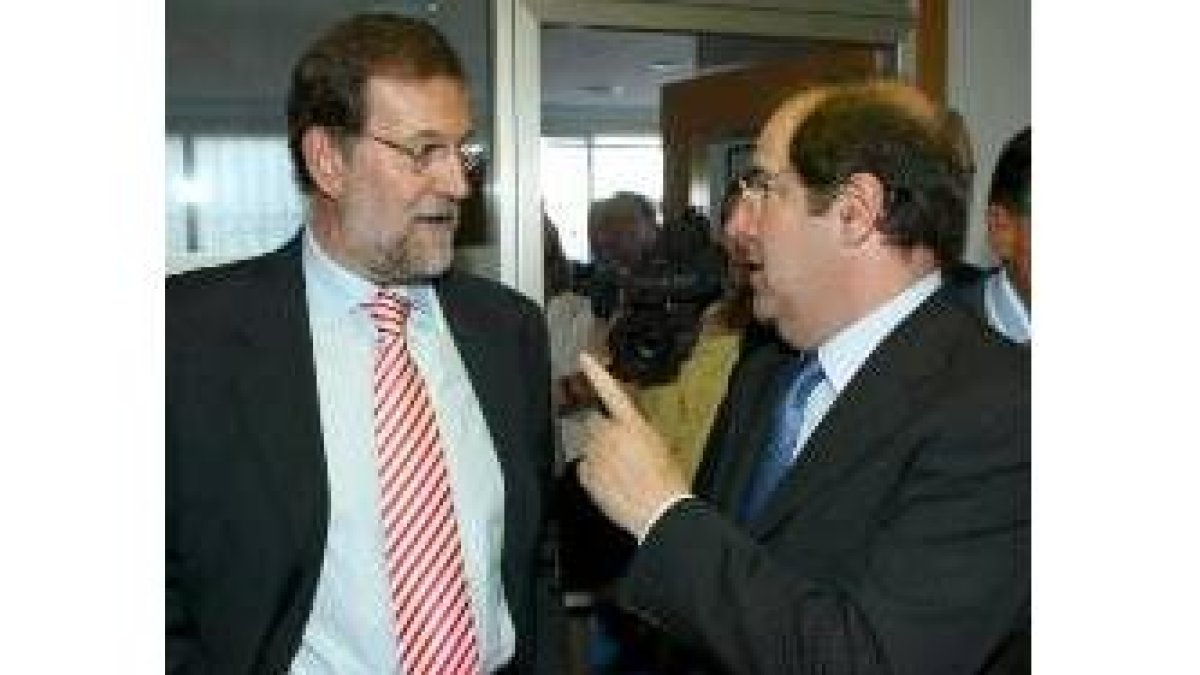 Rajoy y Herrera, durante la reunión de presidentes autonómicos