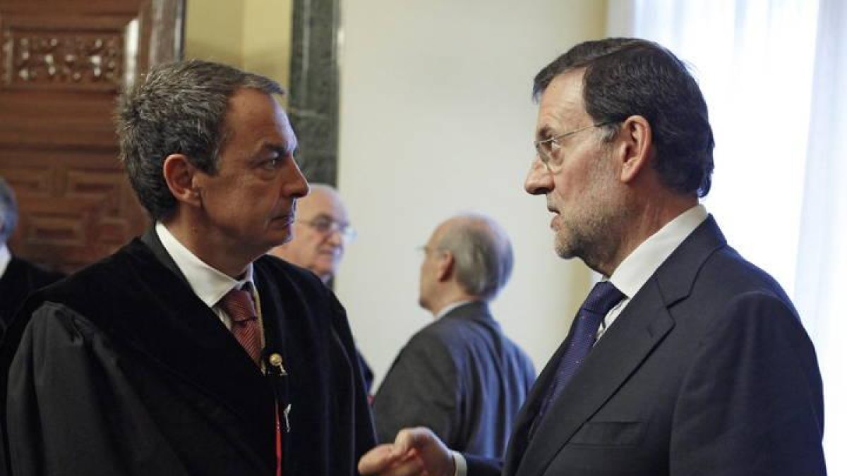 José Luis Rodríguez Zapatero junto a Mariano Rajoy