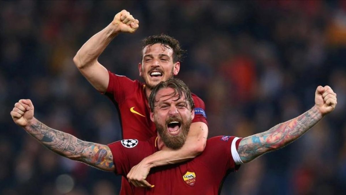 Daniele De Rossi y Alessandro Florenzi celebran el triunfo de la Roma.