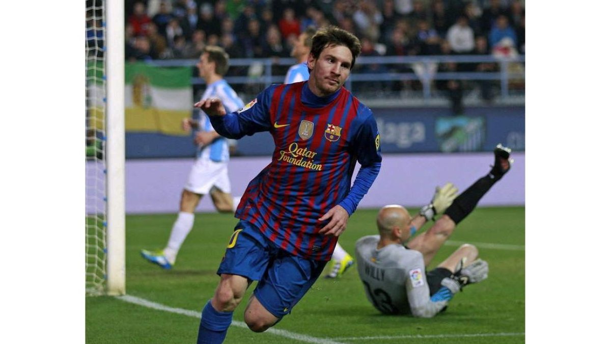 Messi celebra su tercer gol, cuarto del Barcelona, durante el partido frente al Málaga.