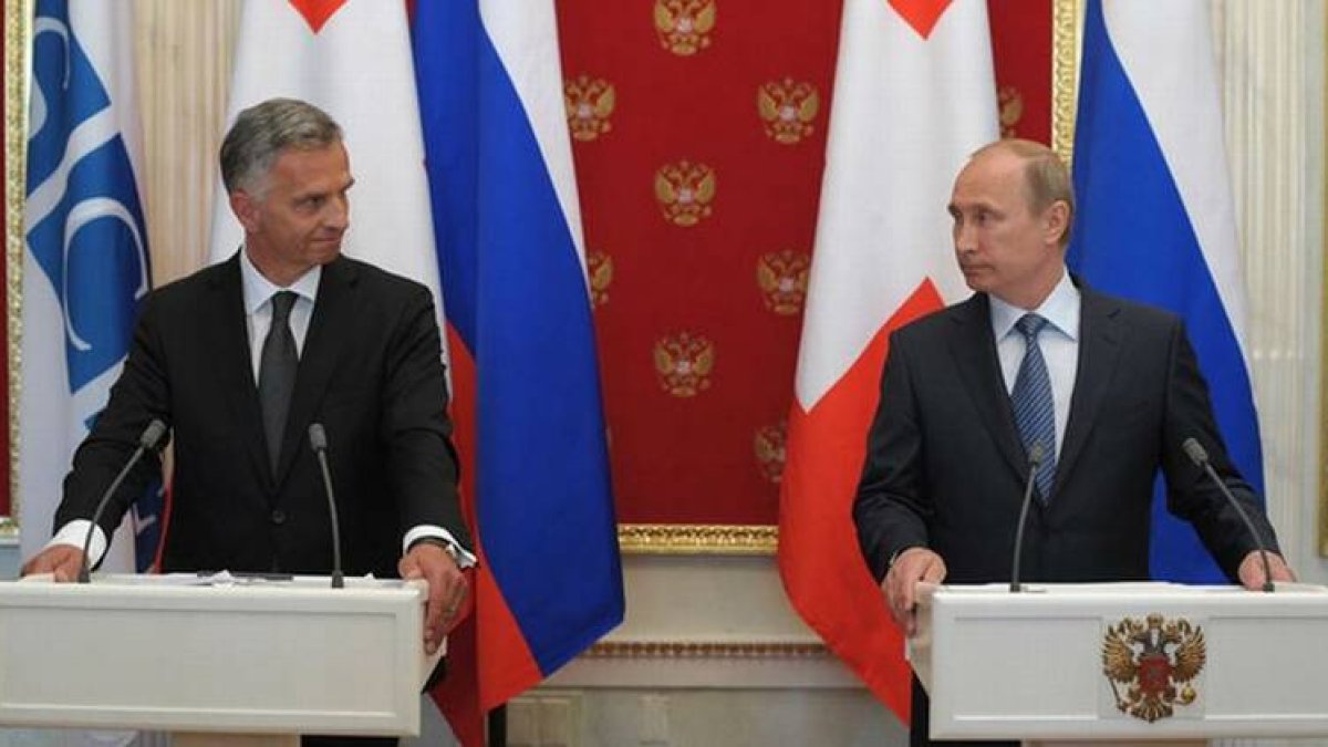 El presidente de turno de la OSCE, el suizo Didier Burkhalter, y el presidente de Rusia,Vladimir Putin, en la rueda de prensa.