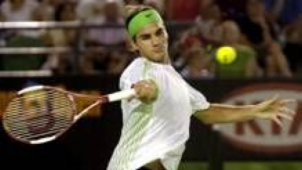Federer supo sufrir ante Davydenko para meterse en su séptima semifinal de Grand Slam consecutiva