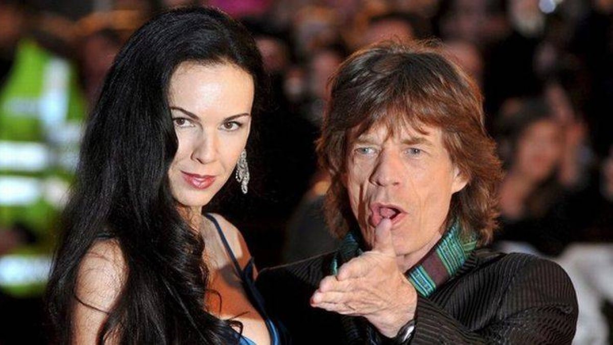 El cantante Mick Jagger y la diseñadora L'Wren Scott en el 2007.