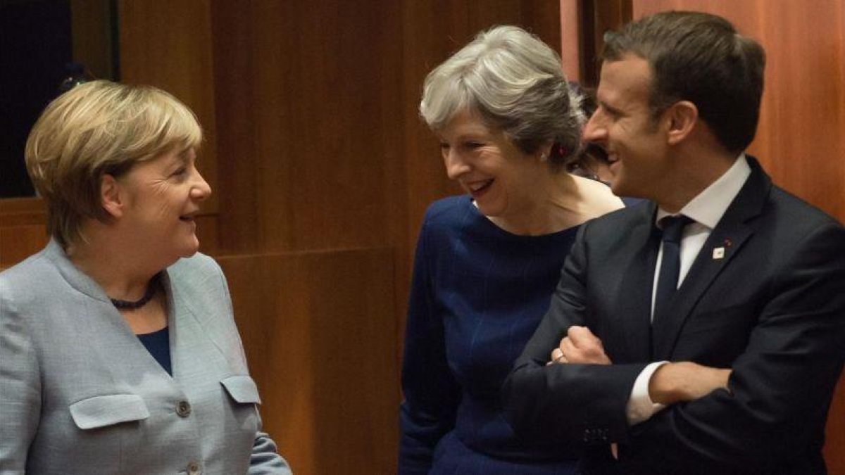 Angela Merkel, Theresa May y Emmanuel Macron en Bruselas el pasado mes de octubre.