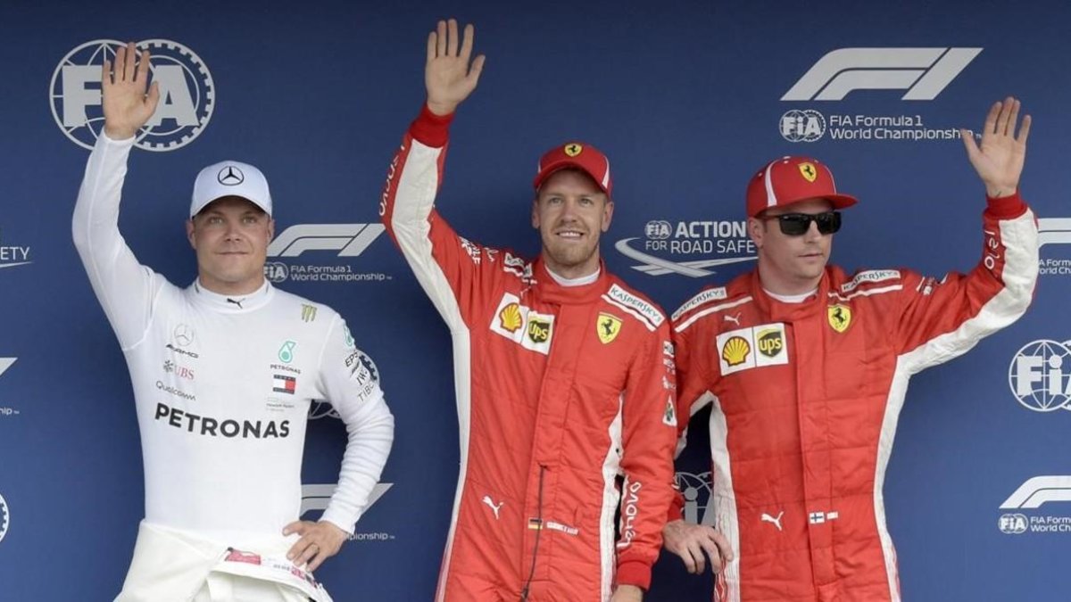 Valtteri Bottas (2º), Sebastian Vettel (1º) y Kimi Raikkonen (3º), en los últimos ensayos hoy del GP de Alemania. /