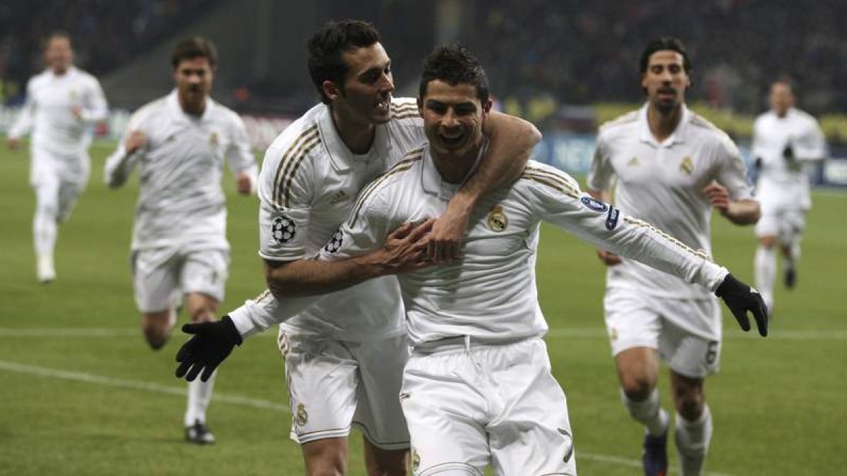 Cristiano celebra con Arbeloa uno de los 123 goles que ha marcado en 125 partidos.