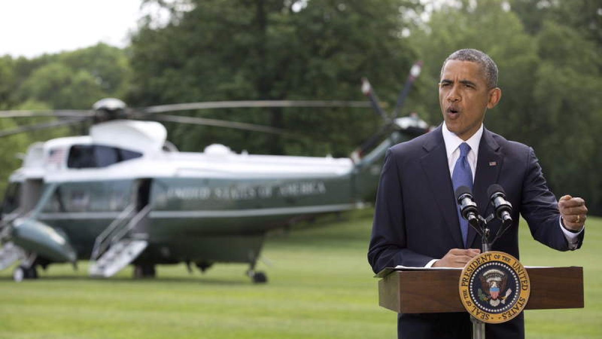 Obama, ayer, en una rueda de prensa en los jardines de la Casa Blanca.