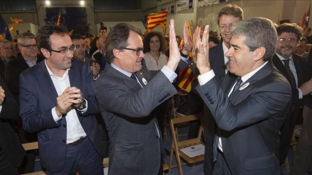 Artur Mas y Francesc Homs, en el mitin de Democràcia i Llibertat en Tarragona.