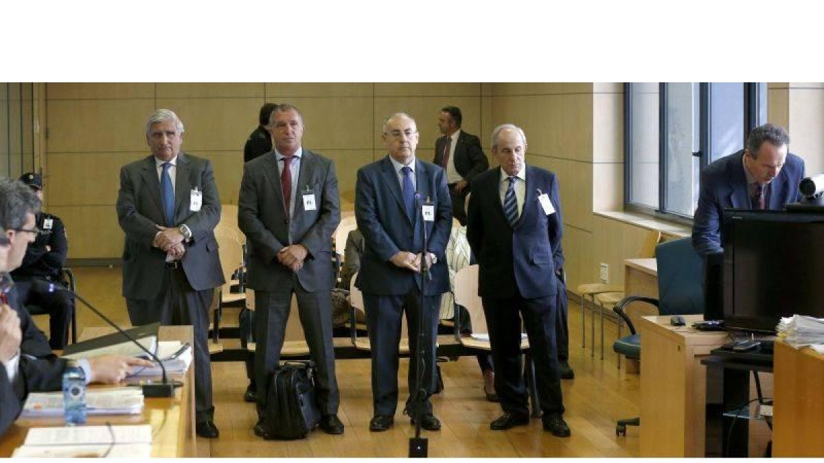 Ricard Pagès, Joan Caellas, Manuel Troyano y Santiago José Abella (de izquierda a derecha), este lunes en la Audiencia Nacional.