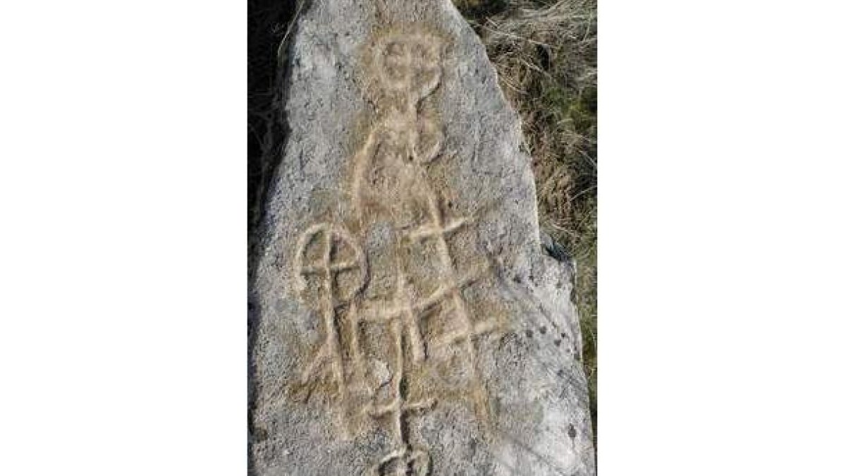 Los dibujos cruciformes en el «menhir».