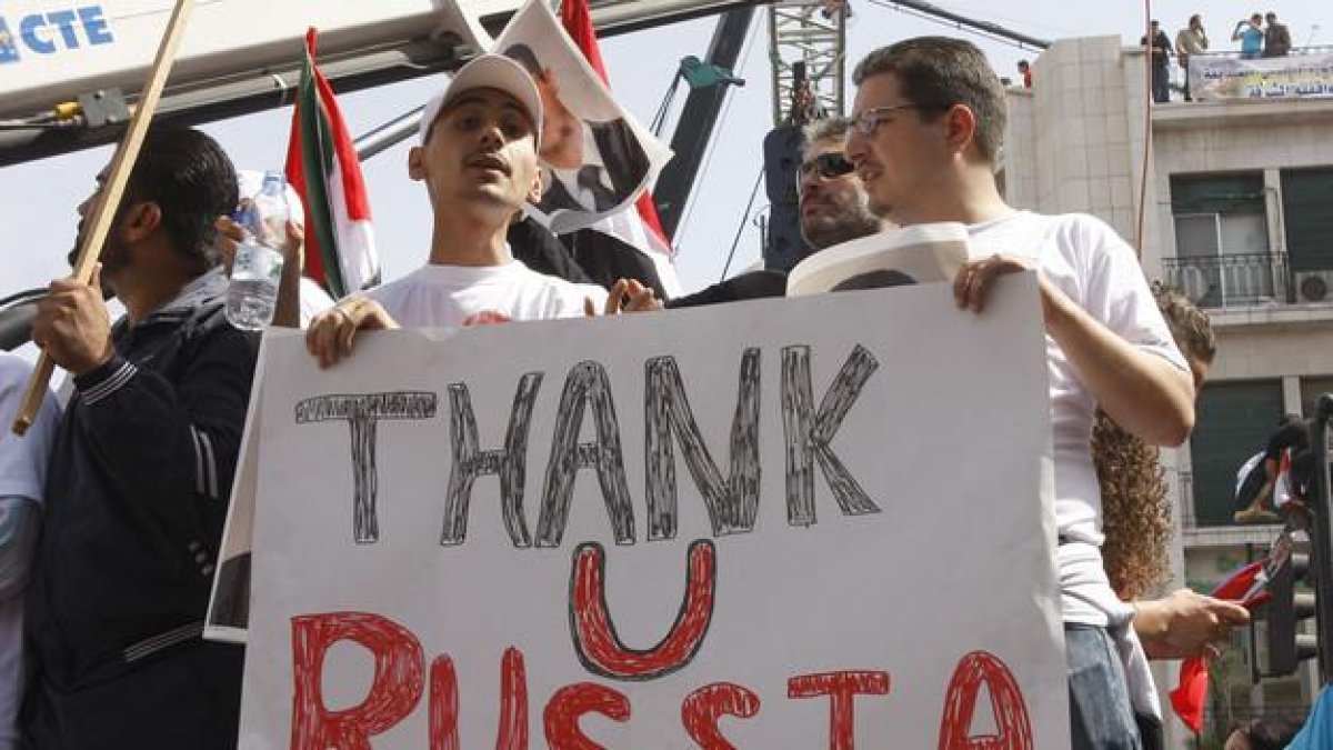 Partidarios del Gobierno sirio se manifiestan en agradecimiento a Rusia, en Damasco.