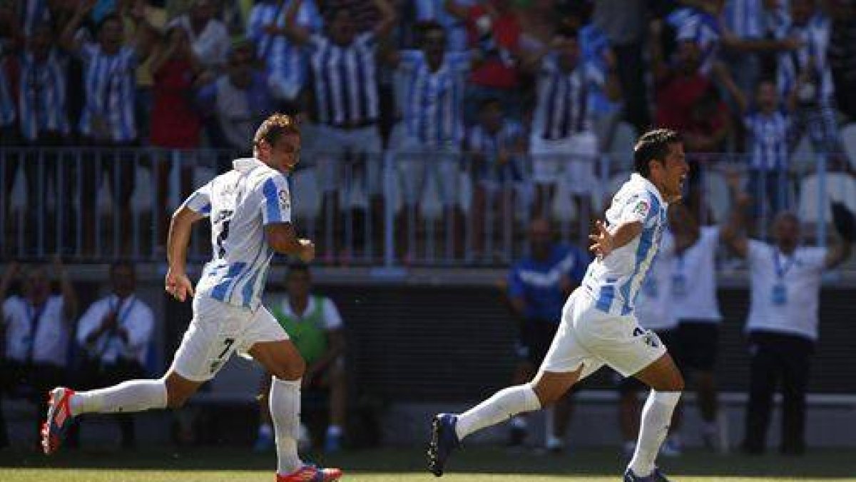 Saviola celebra su gol-