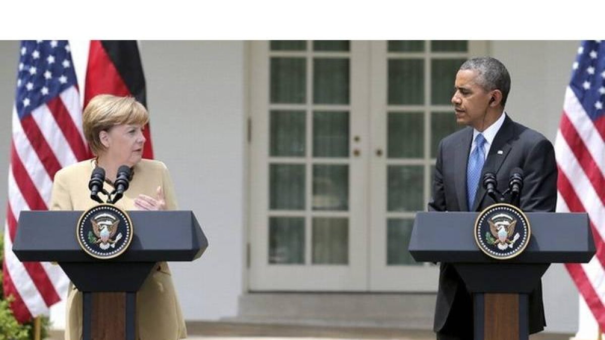 El presidente estadounidense Barack Obama y la cancillera alemana Angela Merkel durante la rueda de prensa tras su encuentro celebrado en la Casa Blanca.