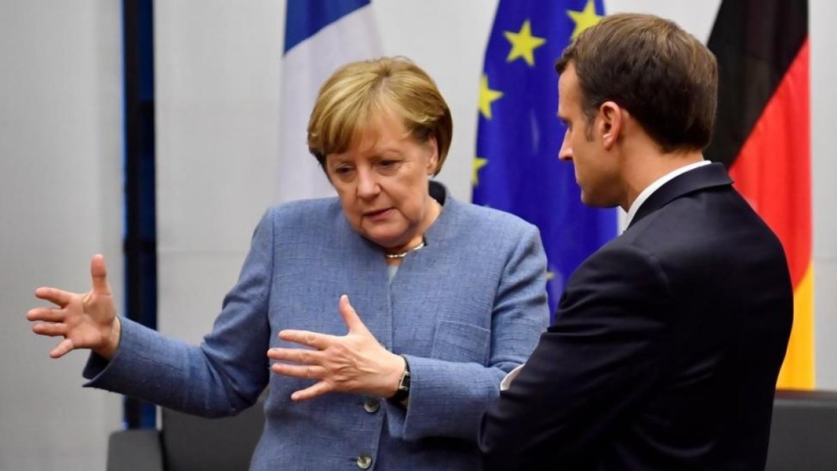 La cancillera Angela Merkel y el presidente Emmanuel Macron, en la cumbre del clima de Bonn (COP23).