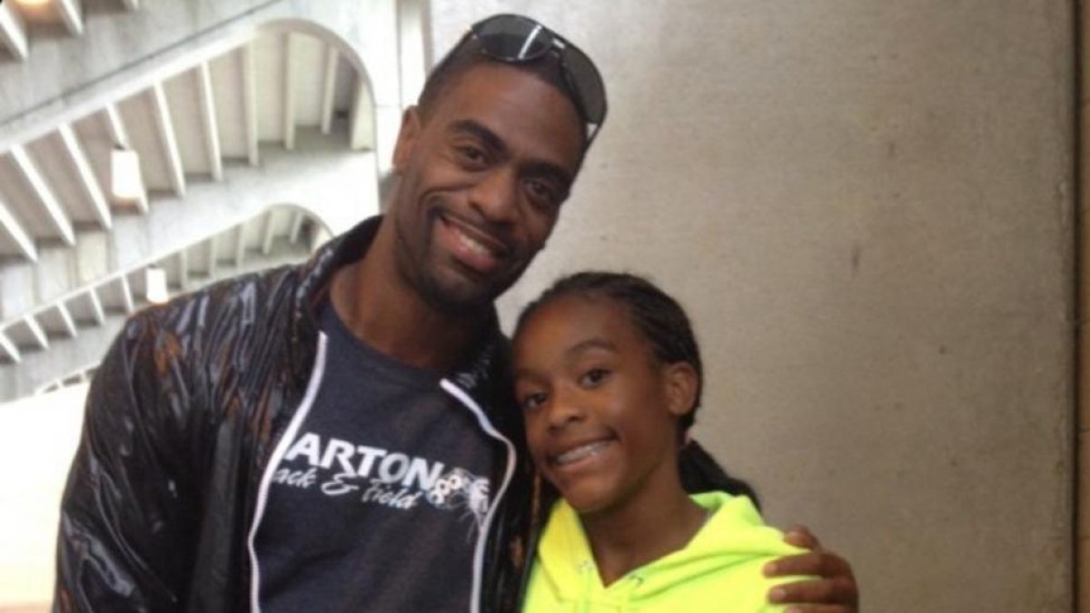 El atleta Tyson Gay y su hija, Trinity.
