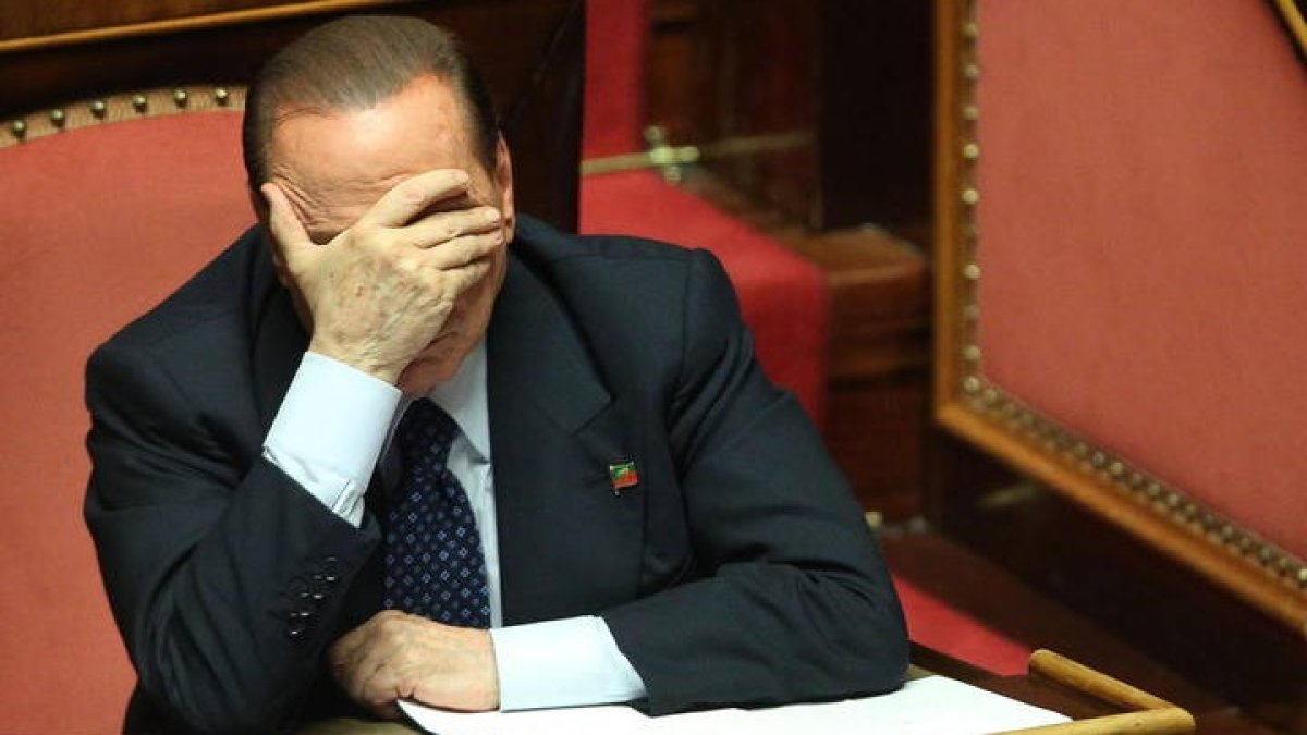 Silvio Berlusconi. DL