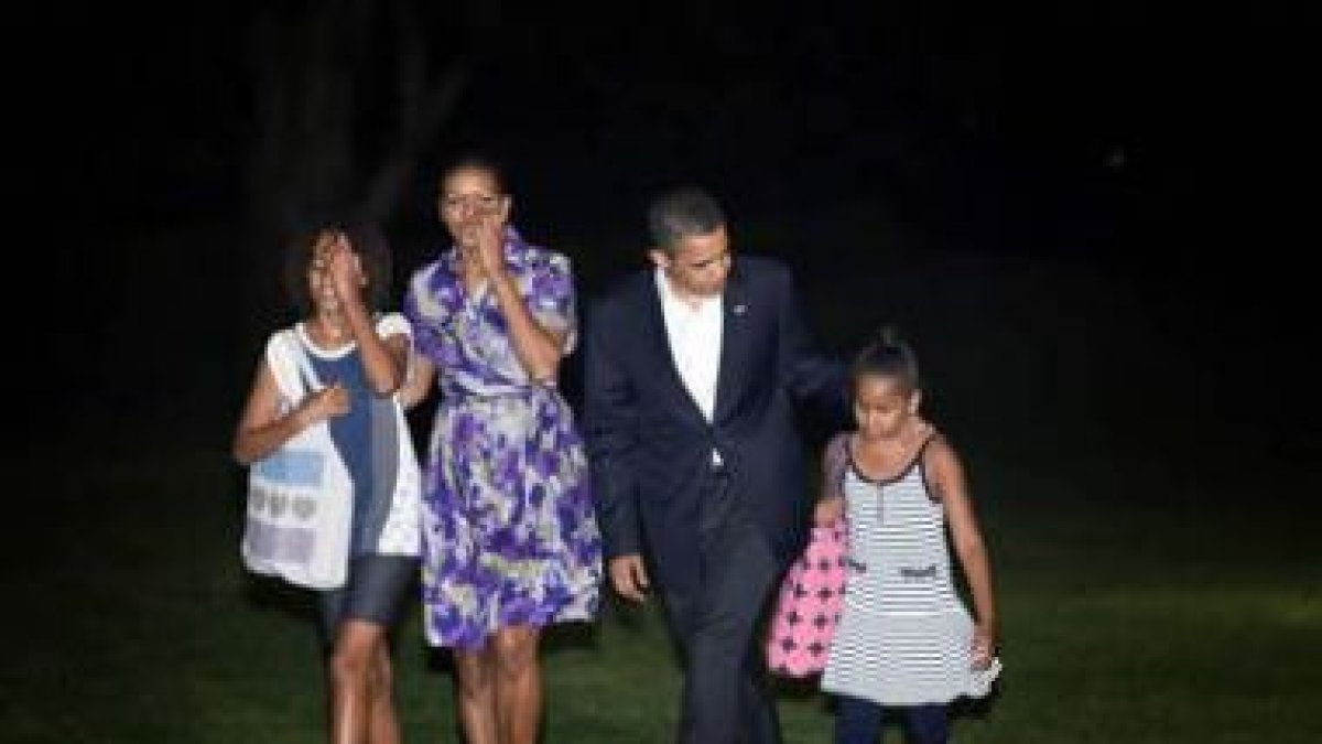 El presidente de EE.UU. Barcak Obama y su familia .