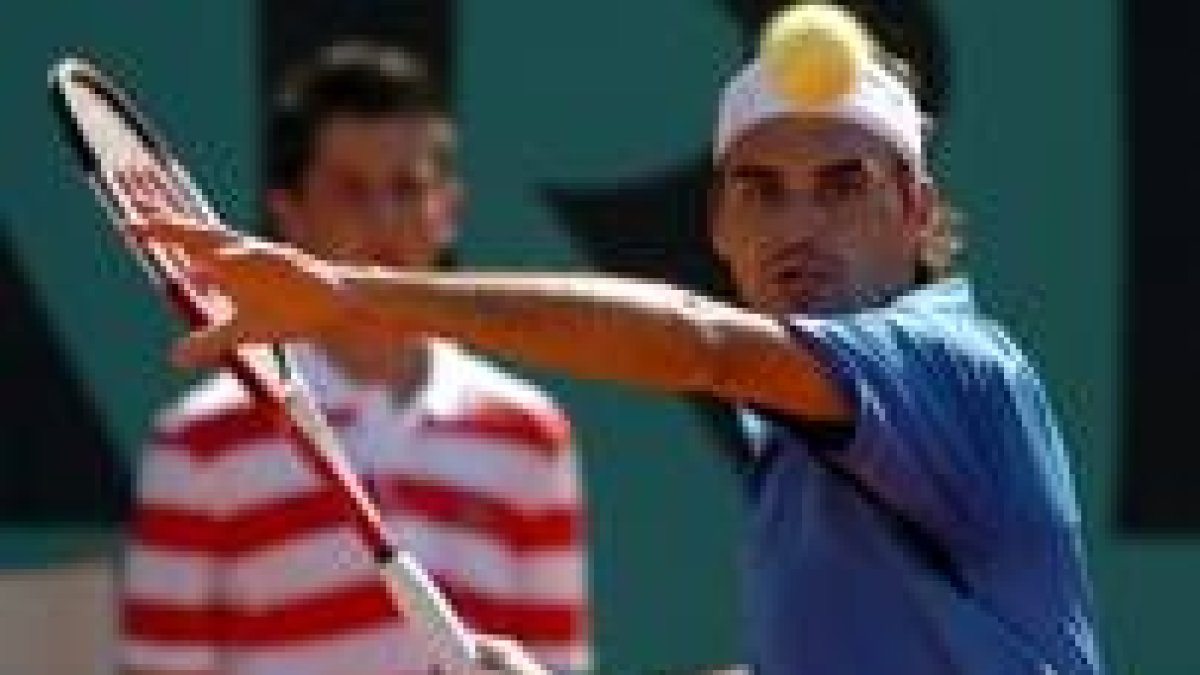 Federer se medirá en semifinales a Nalbandián, un rival que parece haberle tomado la medida al suizo