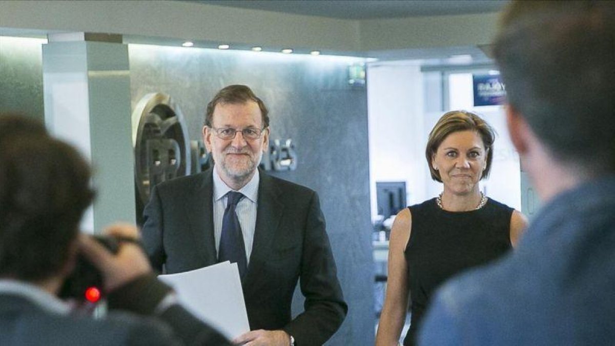 Mariano Rajoy y Dolores de Cospedal, este lunes a su llegada al comité de dirección del PP