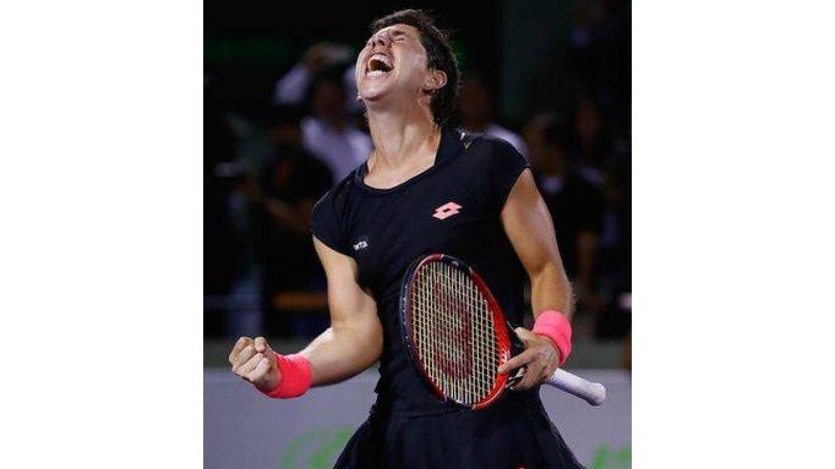 Carla Suárez, eufórica tras batir a Venus Williams en cuartos de final del torneo de Miami.