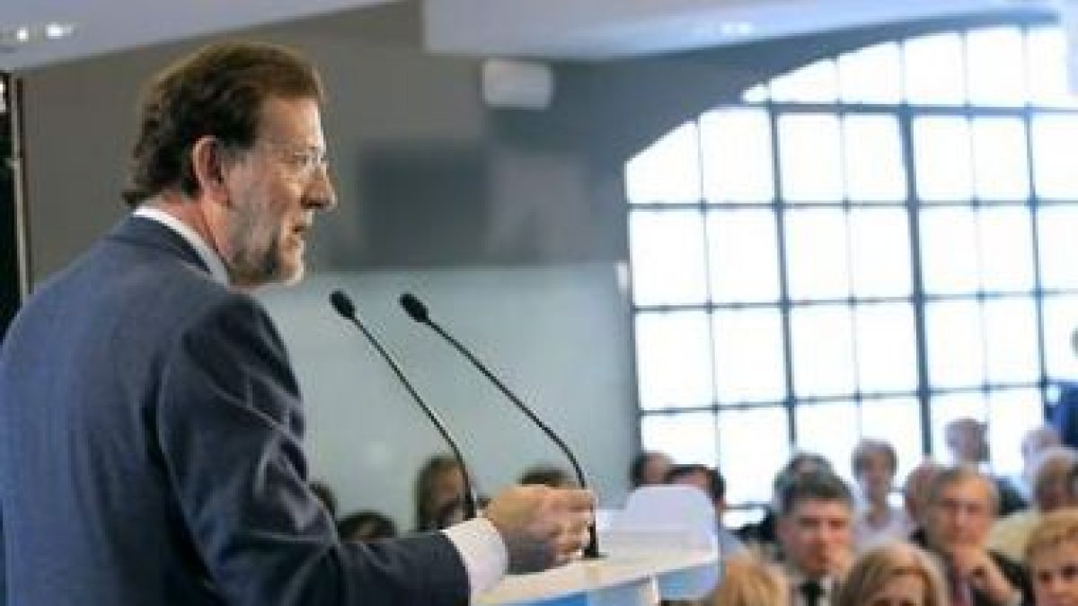 Rajoy, durante su intervención en el almuerzo con afiliados del partido en Puertollano.
