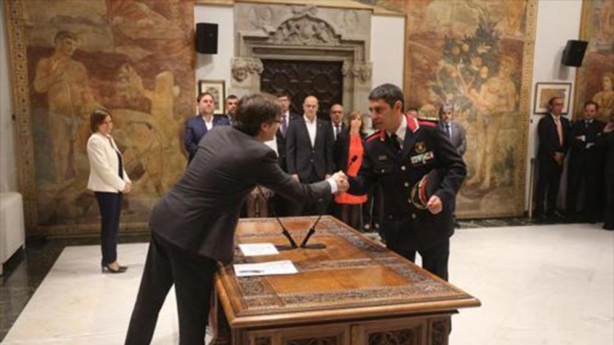 Carles Puigdemont y Josep Lluís Trapero, en una imagen de archivo.