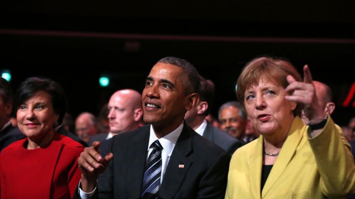 Obama y Merkel en la feria industrial de Hanover (Alemania).
