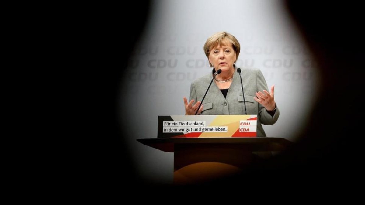 Merkel interviene en el mitin de Dortmund, el 12 de agosto.