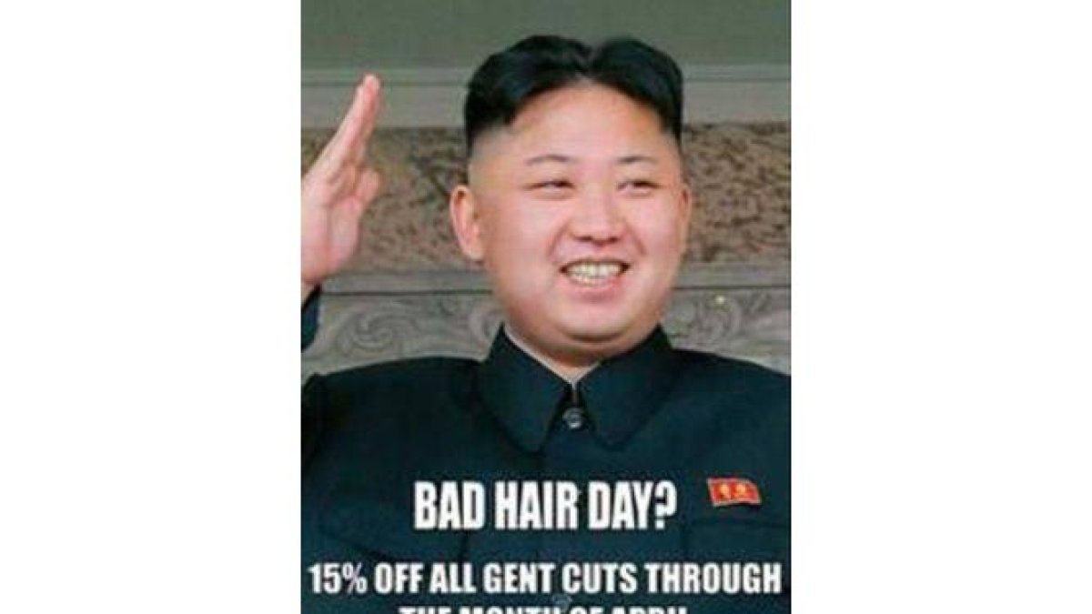 El polémico cartel con la imagen de Kim Jong-un colgado en una peluquería de Londres.