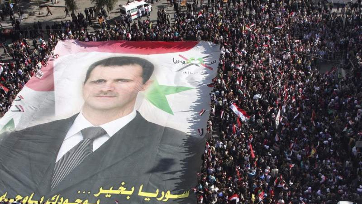 Simpatizantes de Bachar al Asad durante la protesta.