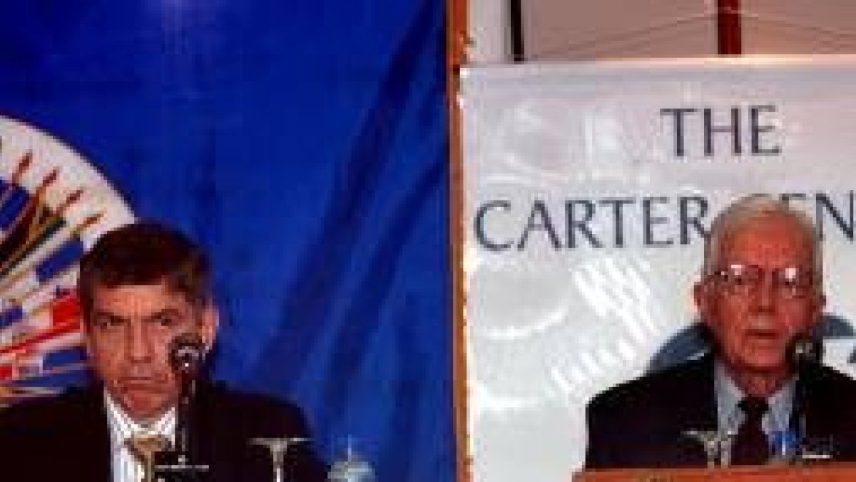 El secretario de la OEA, Gaviria, y ex presidente de EE.UU., Carter