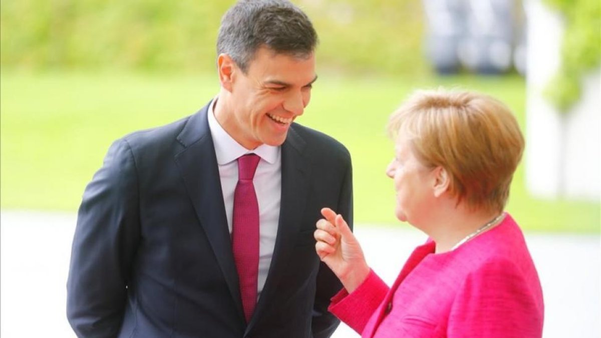 Primera reunión entre Pedro Sánchez y Angela Merkel en Berlín.
