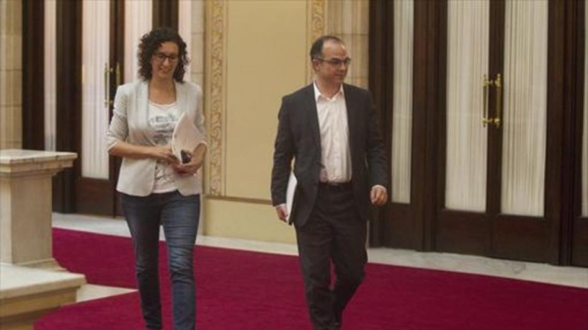 Marta Rovira y Jordi Turull, en el Parlament.
