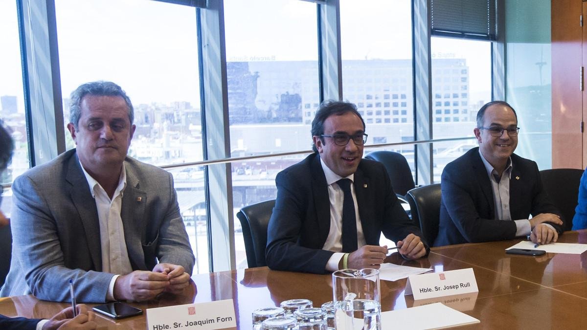Joaquim Forn, Josep Rull y Jordi Turull, en una reunión en agosto del 2017.